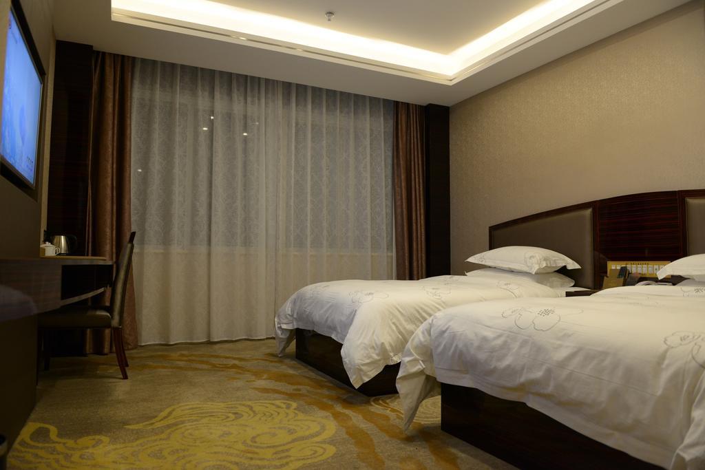 Tie Cheng Hotel Kanton Zimmer foto