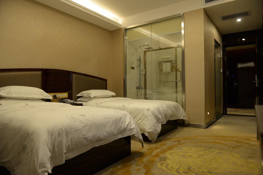 Tie Cheng Hotel Kanton Zimmer foto